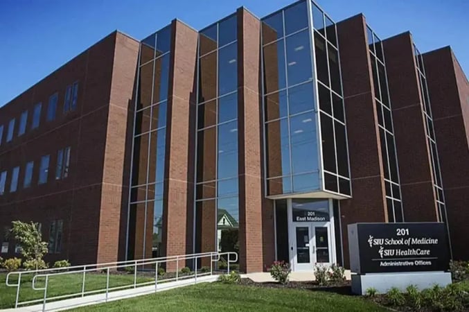 Front Street view of the Southern Illinois University School of Medicine building with a Fram leading to the front entrance.