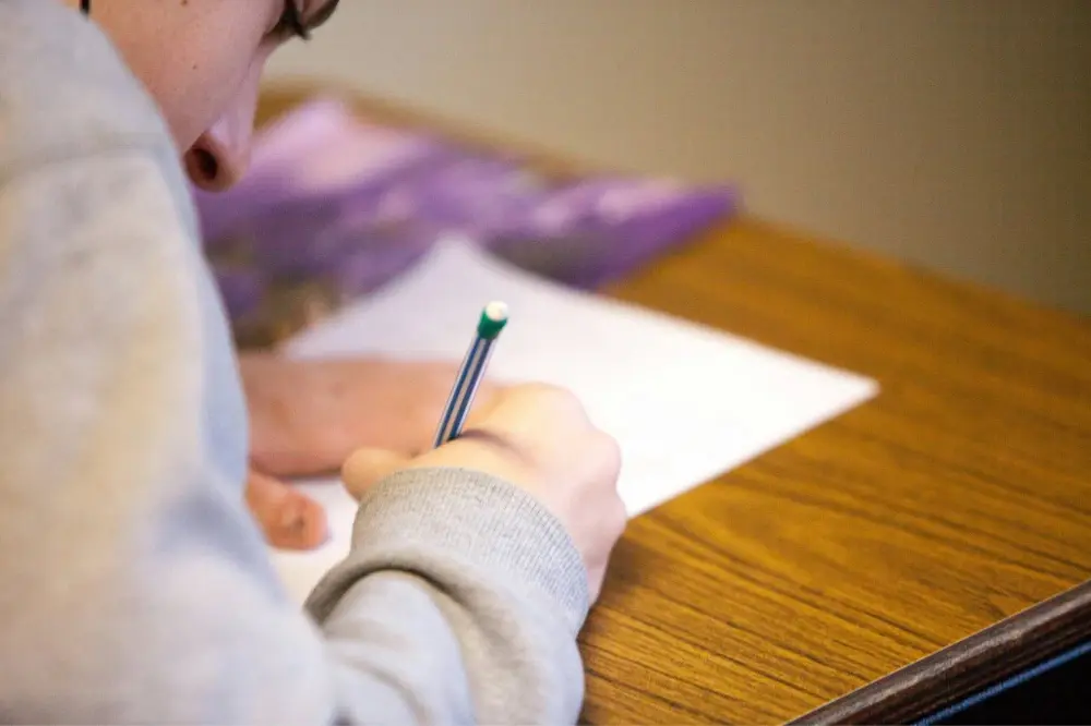 Student writing an essay