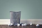 crumpled paper missing trashcan