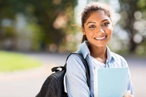 smiling woman before getting into school