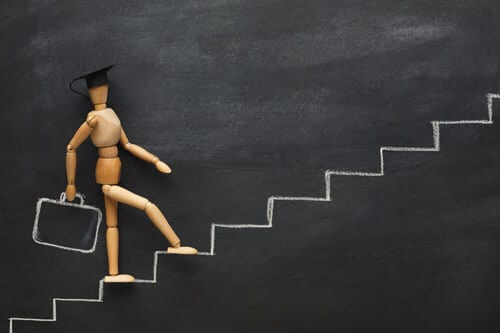 wooden figure on chalk drawn steps