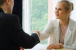 Prospective Medical Student Getting Shaking Hands With Interviewer for Medical School