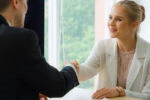 Prospective Medical Student Getting Shaking Hands With Interviewer for Medical School
