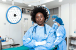 black female doctor in a surgical suite facing the camera