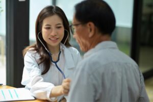 Doctor Checking a Patients Heart