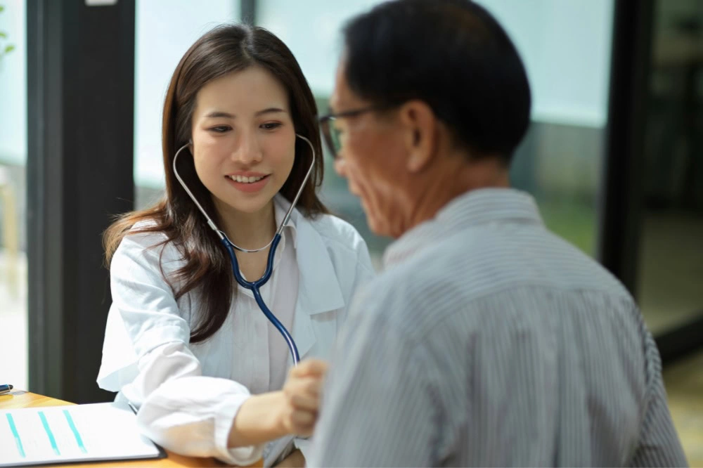 Doctor Checking a Patients Heart