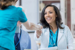 Medical Student helping another student