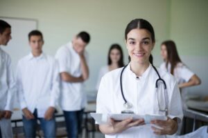 Medical Student Preparing for residency program with a white coat.