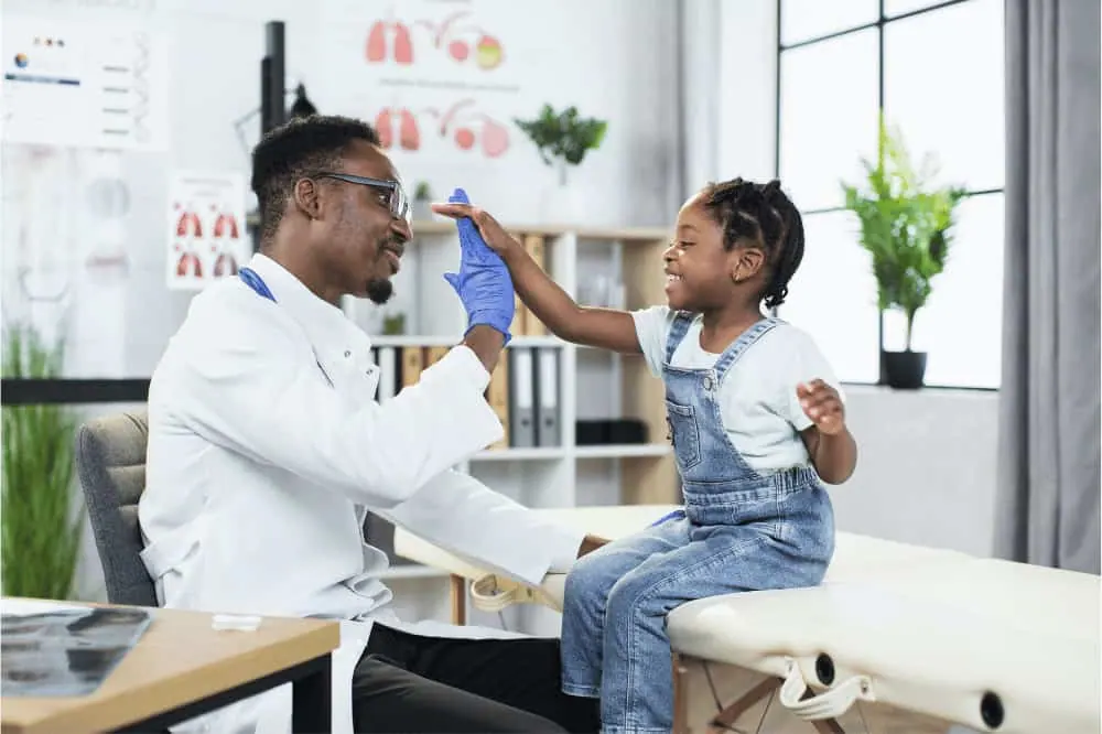 Resident working with a patient.