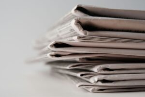 A stack of newspaper articles