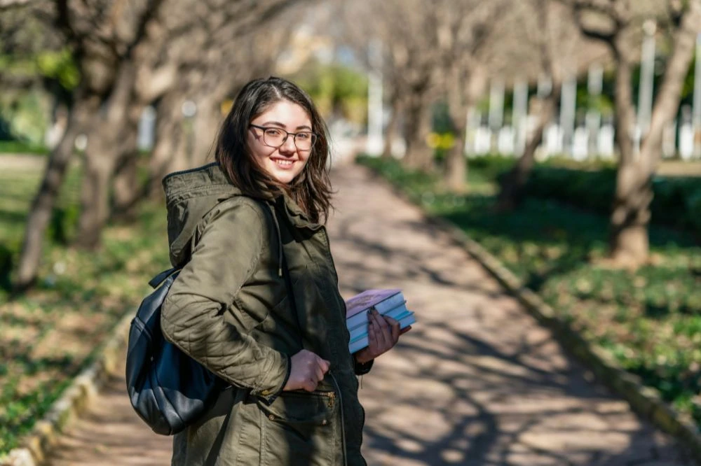 Student walking to class preparing for medical school.